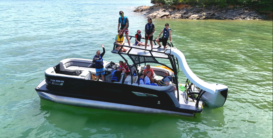 Godfrey pontoon boat on the water